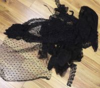 A 19th century bobbin lace shawl and quantity of mixing black lace trimmings