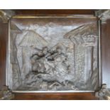 A framed spelter relief plaque, of the Mongols in battle, 59cm wide, 51 cm high, including frame