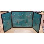 A Chinese embroidered silk inset three fold screen, largest panel 40 x 47cm