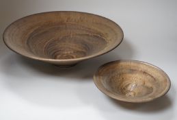 Huw Powell Roberts - two white earthenware open dishes covered in mottled bronze glaze with gold