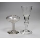 An 18th century glass oil lamp with a Silesian stemmed wine glass, tallest 13.5cm