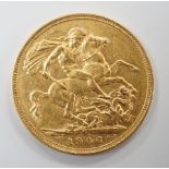 An Edward VII 1906S gold sovereign.