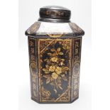 A 19th century toleware octagonal tea canister, J. Newman, Dublin, painted with flowers and