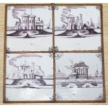 A set of four 18th century Dutch Delft manganese tiles decorated with buildings by a canal (frame