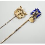 An early 20th century yellow metal enamel and diamond set ribbon bow stick pin, hung with a