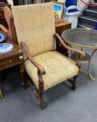 A Louis XIV style carved walnut framed fauteuil, width 65cm, depth 60cm, height 120cm