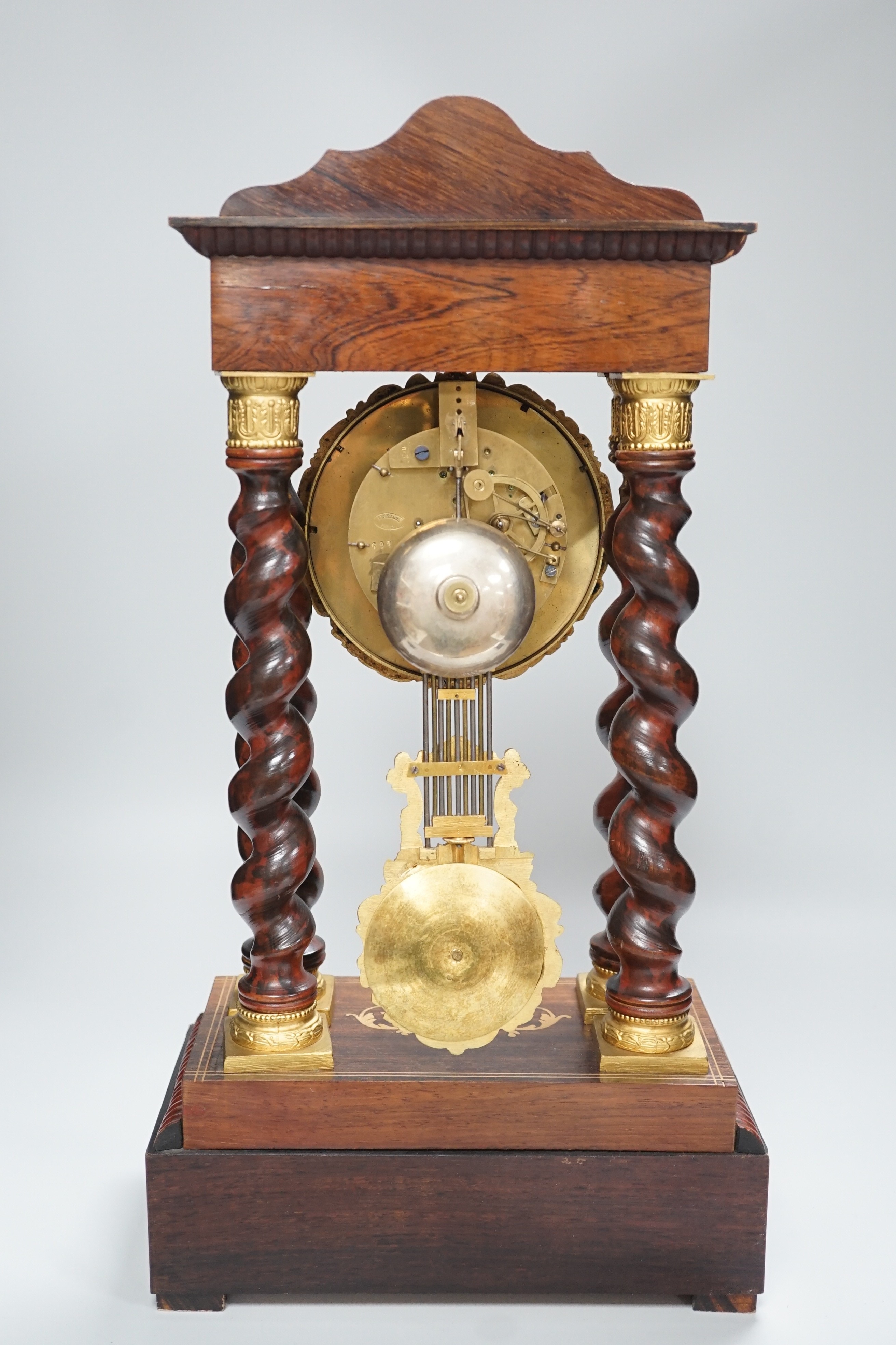 A 19th century Napoleon III rosewood inlaid and ormolu mounted portico clock, 47cms high - Image 3 of 4