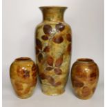 Royal Doulton Natural Foliage Ware - a pair of vases and a larger vase, larger vase 40cms high