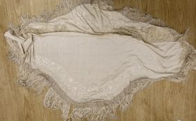 A late 19th/early 20th century Chinese cream silk shawl with cream silk embroidery and fringing,
