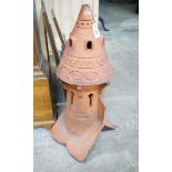 A terracotta dovecote hip tile, height 89cm