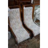 A pair of Victorian inlaid mahogany slipper chairs