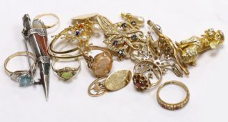 Six assorted mainly modern 9ct gold and gem set dress rings, including cameo shell, blue zircon
