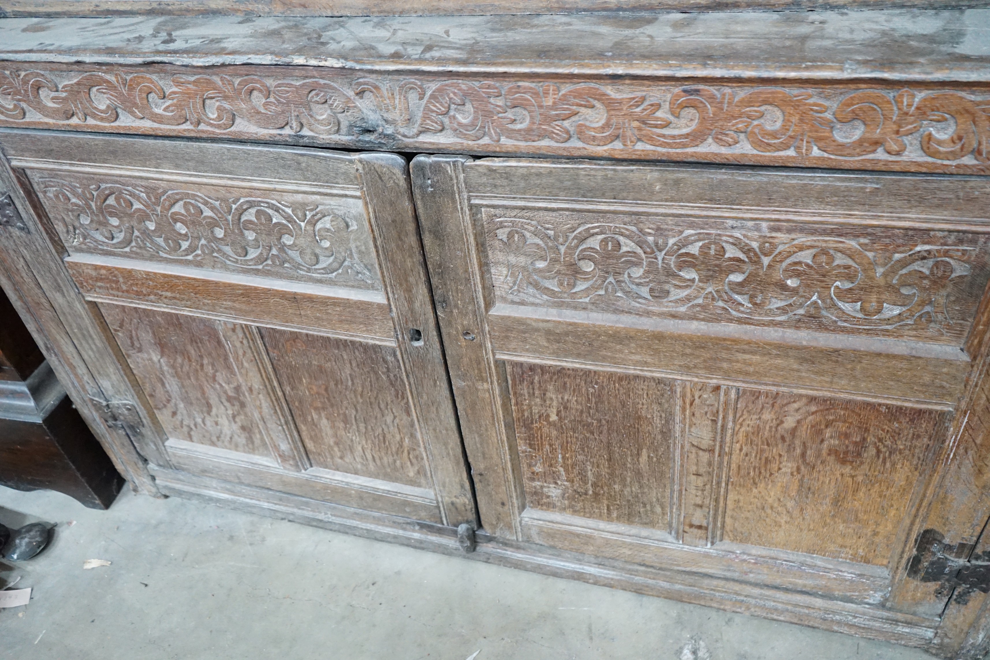 A 17th century carved oak court cupboard, dated 1685, width 170cm, depth 55cm, height 150cm - Image 4 of 4