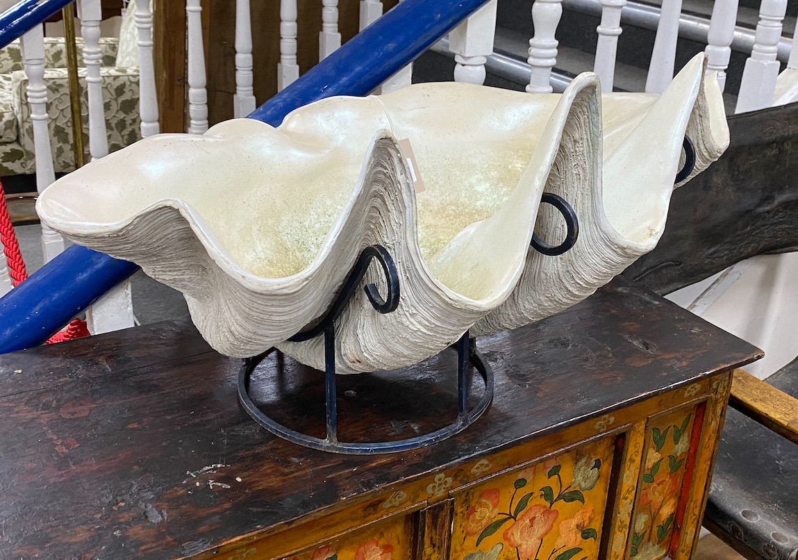 A large simulated clam shell, on stand, width 82cm, height 42cm
