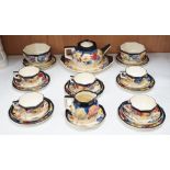 A Doulton “pansy” design tea set, marked on base D4049, Reg no:597783