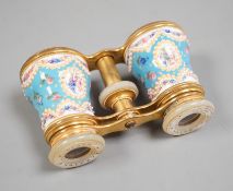 A pair of French enamel, brass and mother of pearl opera glasses, signed ‘Le Maire Paris’, in