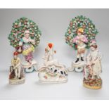 A pair of Derby style bocage figures and three other figures, tallest 26cms high,