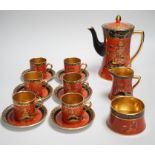A Carltonware Japanese style coffee set: base marked 2880, coffee pot and cover 19.5 cms high