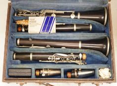 A cased pair of ebony jazz clarinets, 1920's, by Rudall, Carte & Co.