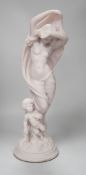 A resin marble figure of Venus and Cupid, 49cm high
