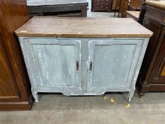 A 19th century French part painted oak and pine two door cupboard, width 127cm, depth 62cm, height