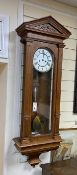 A 19th century German Vienna regulator wall clock, Lenzkirch movement with pendulum and weights, oak