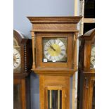 An oak longcase clock, with a square brass and silvered dial, height 203cm