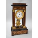 A late 19th century rosewood and marquetry portico clock with ormolu mounts