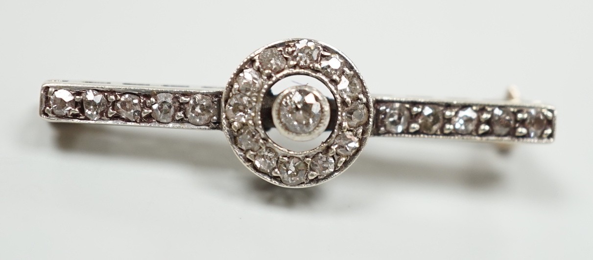 An early 20th century 9ct white metal diamond target cluster set bar brooch, 30mm, gross weight 2. - Image 2 of 3