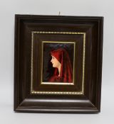 A framed Limoges enamel plaque of Fabiola, after Henner, 10cms x 13.5cms high