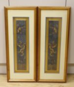 A pair of framed early 20th century Chinese metal thread embroidered ‘dragon’ design sleeve bands,