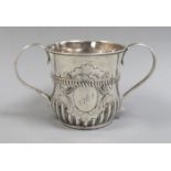 An early George III demi-fluted silver porringer, by John Moore, London, 1761, height 85mm, 7.2oz,