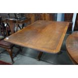A George III satinwood banded rectangular mahogany tilt top dining table, length 152cm, depth 104cm,
