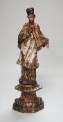 An 18th/19th century Continental carved wooden polychrome figure of saint, 33cms high