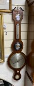 An early 19th century mahogany wheel barometer with bone insets, height 95cm