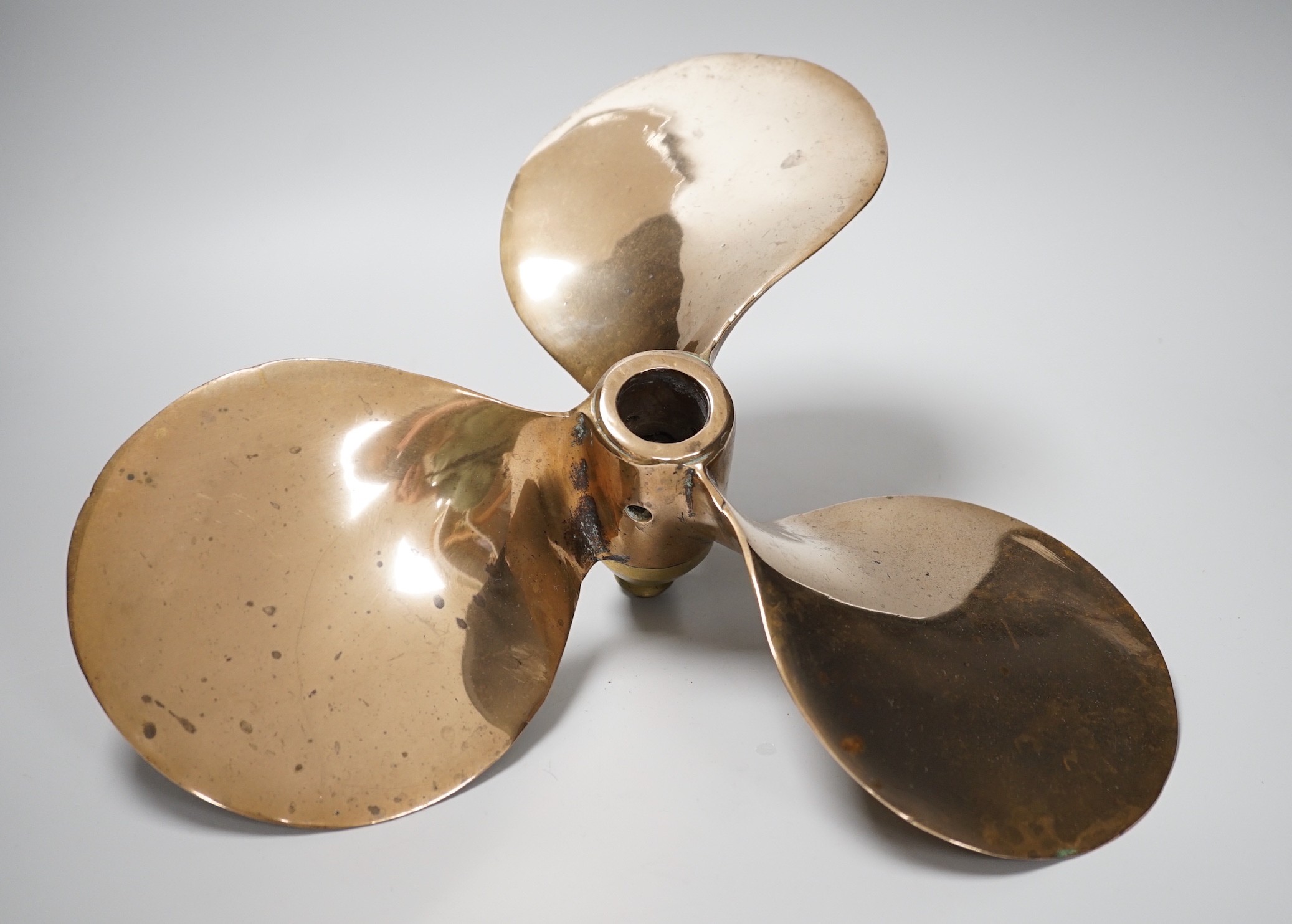 A lifeboat bronze propeller. 35cm diameter approx. salvaged from Chittagong ship yard between 1984-