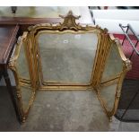 An early 20th century carved giltwood triptych dressing table mirror, width 136cm, height 89cm