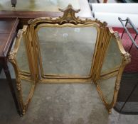 An early 20th century carved giltwood triptych dressing table mirror, width 136cm, height 89cm