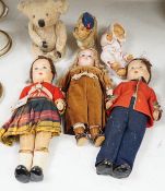 Two Chad Valley felt soldier dolls with glass eyes, a German bisque head doll, a rubber doll and a