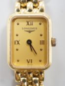 A lady's 2001 18ct gold Longines quartz wrist watch, with rectangular part Roman dial, on 18ct