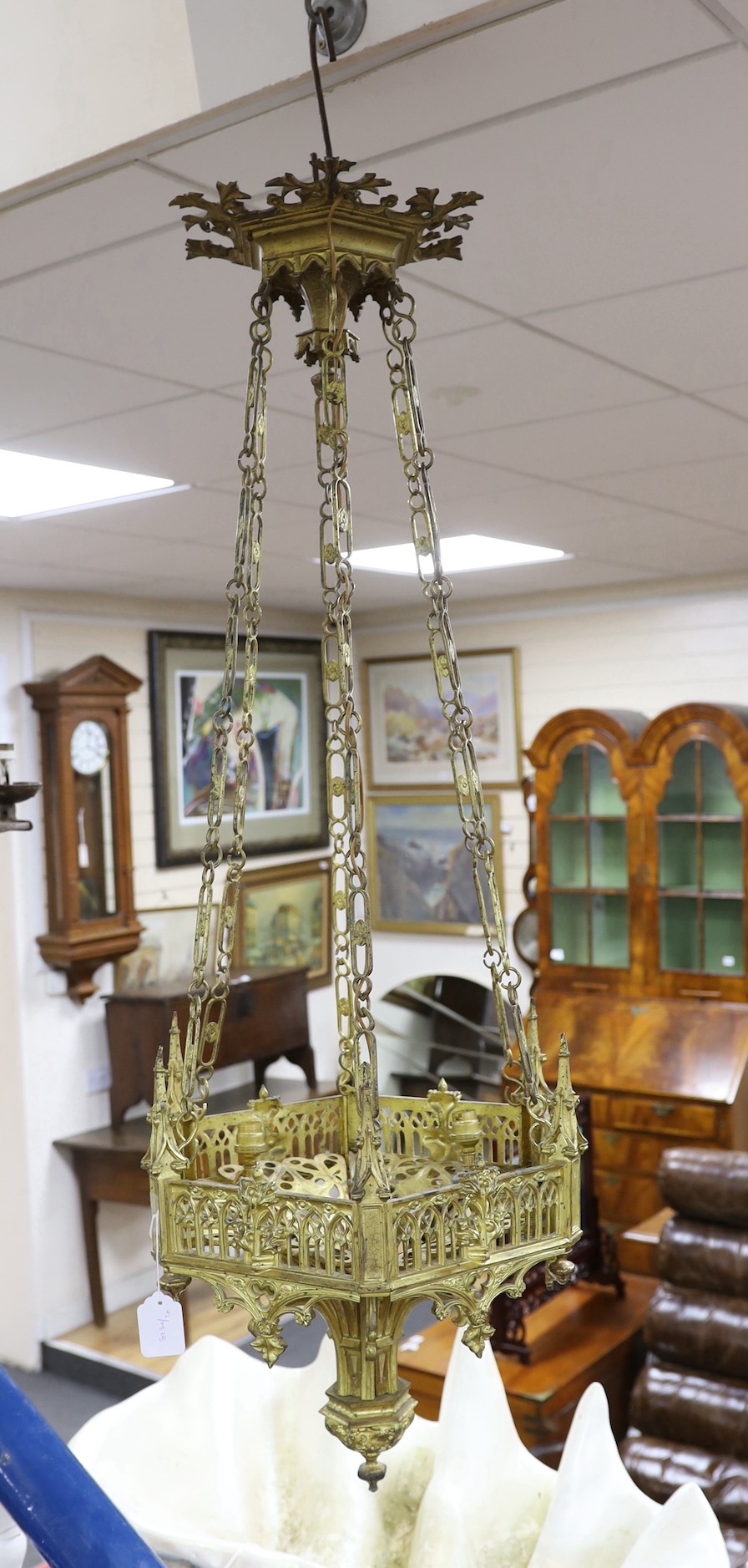 A Neo Gothic 19th century ormolu three light ceiling light, 115cm drop from rose