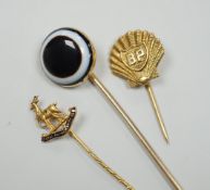 A Victorian yellow metal and banded agate set stick pin, 84mm, a yellow metal Royal Warwickshire