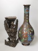 A large Japanese enamelled bronze vase and a Balinese wood carving. Tallest 44cm