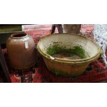 A large circular terracotta pail and a rhubarb planter, larger width 84cm, height 30cm