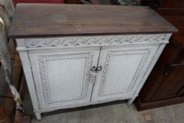 A Regency style painted pine two door side cabinet, width 101cm, depth 39cm, height 94cm