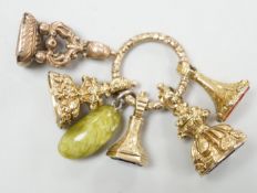 Four Victorian assorted yellow metal and gem set fob seals, including two amethyst(one carved with