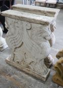 A near pair of carved stone lion table supports, width 59cm, height 77cm