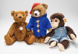 Three boxed Steiff toys: a Paddington bear, a brown bear and a monkey,