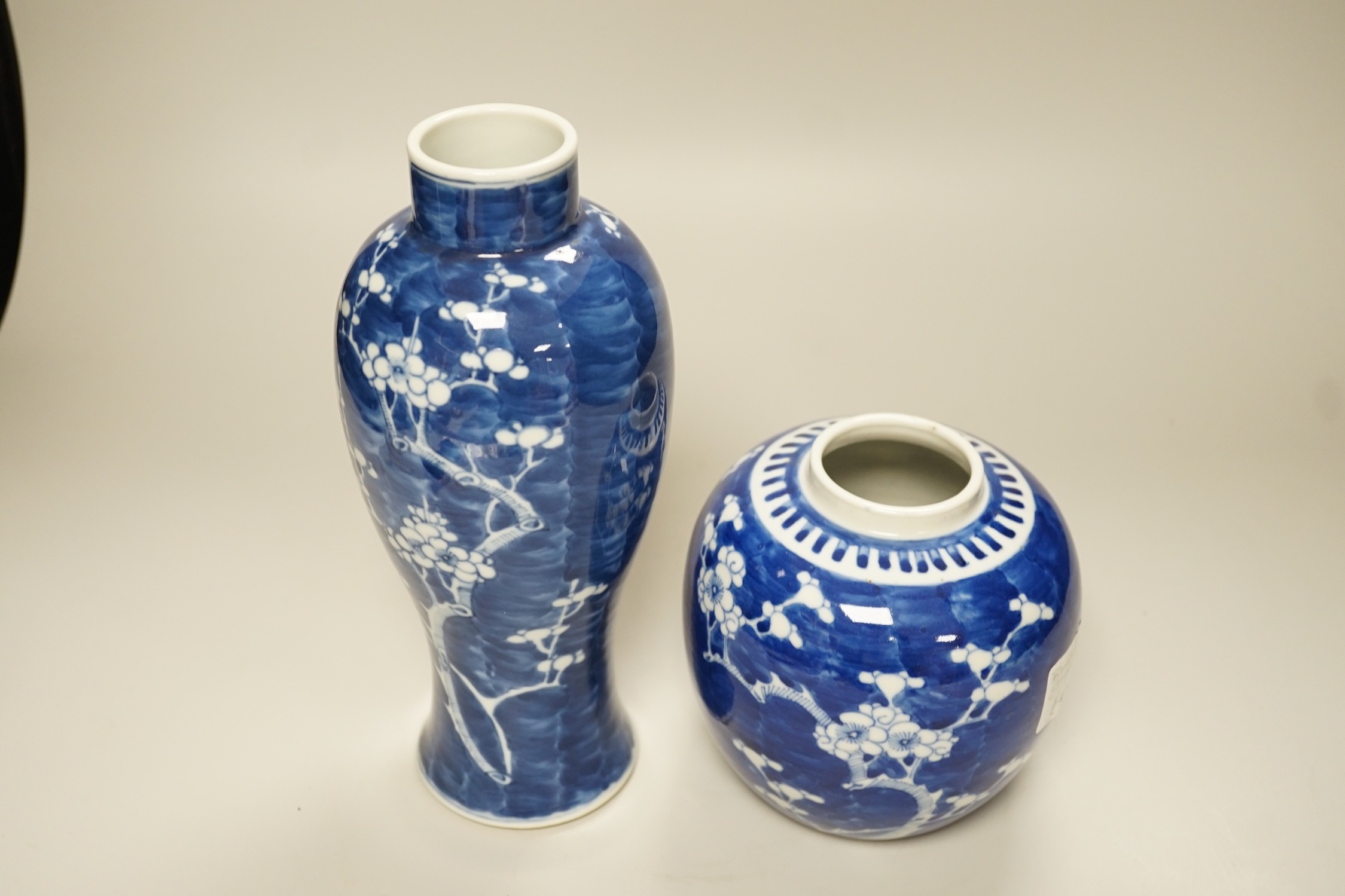 A Chinese blue and white prunus vase and a similar jar, late 19th century, vase 13.5cms high - Image 3 of 4