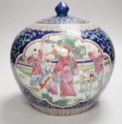 A Chinese famille rose jar and cover, 20cm high